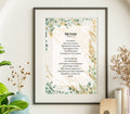 Framed print of 'Our Father' prayer on a wall with decorative elements.